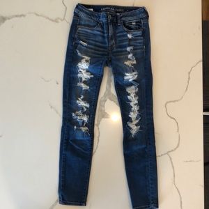 American Eagle, dark washed, distressed jean
